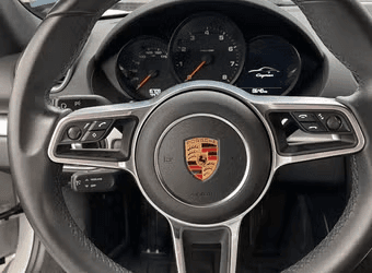 Porsche 718 Cayman — steering wheel and instrument cluster