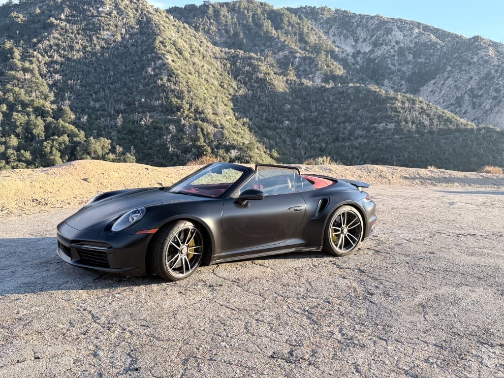 Porsche 911 Turbo S Cabriolet — side view with yellow PCCB calipers