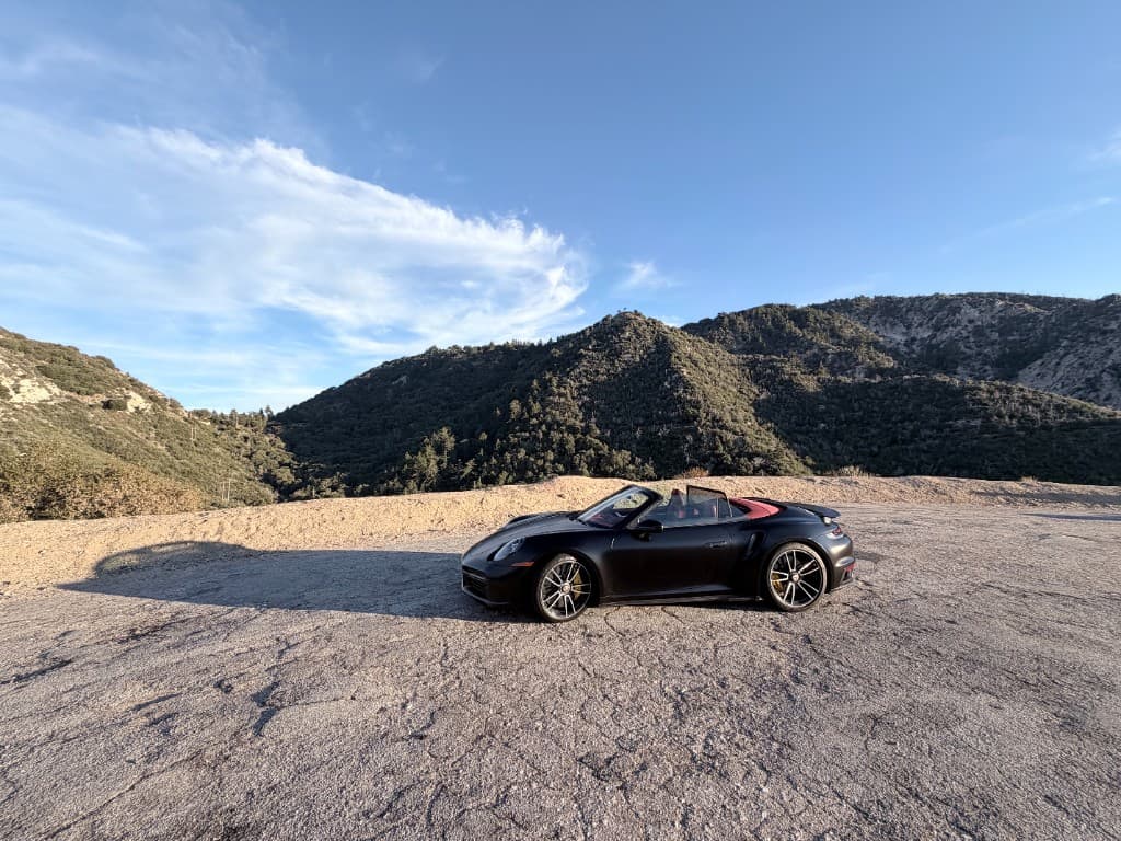 Porsche 911 Turbo S Cabriolet — side angle in golden-hour light