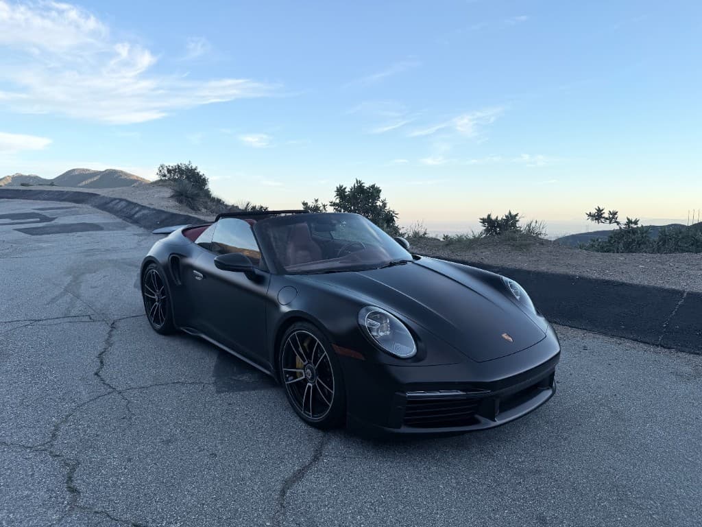 Porsche 911 Turbo S Cabriolet — front three-quarter, top down