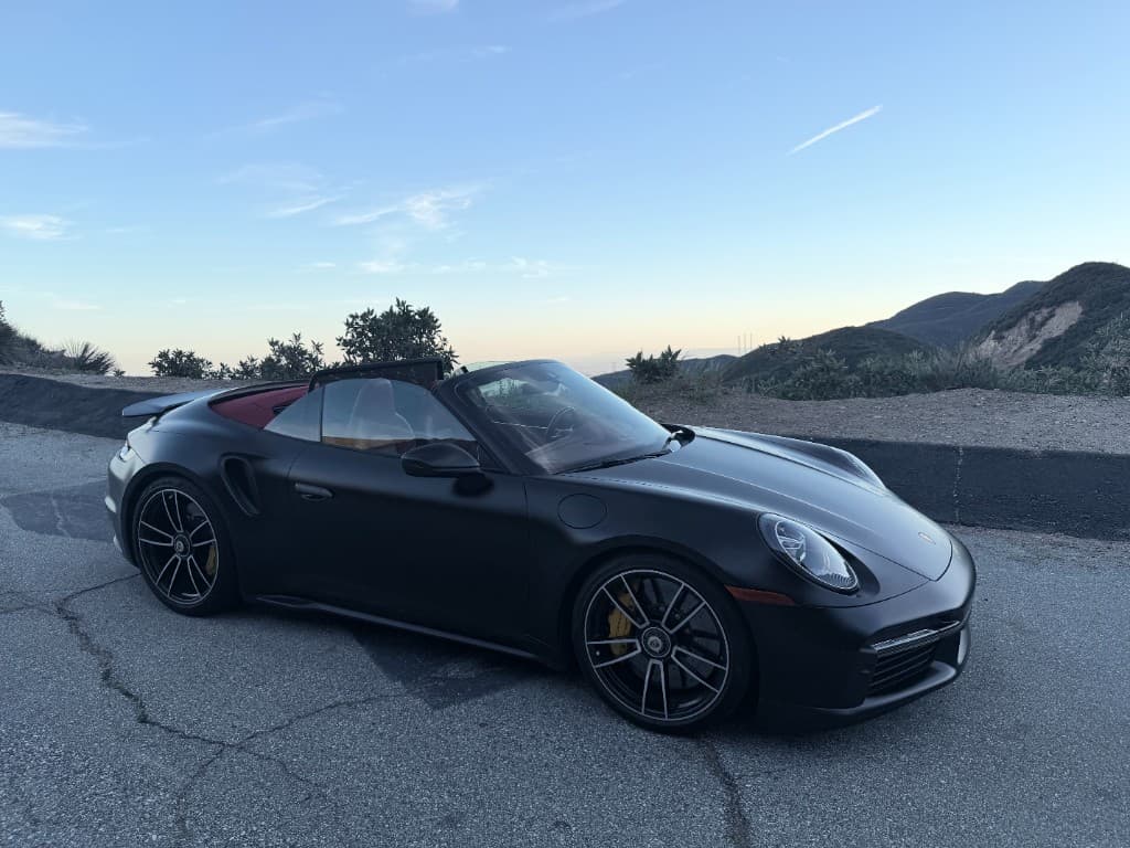 Porsche 911 Turbo S Cabriolet — front three-quarter at a canyon lookout