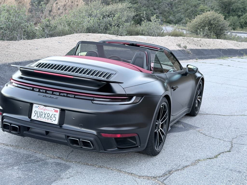 Porsche 911 Turbo S Cabriolet — rear angle at a mountain overlook